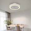 A modern dining room with a ceiling fan and light fixture. Náhľad obrázku produktu