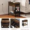 A collage of images showing a vintage-style side table with integrated charging ports and storage compartments, placed next to a sofa. Produktbild-Vorschau