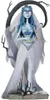 A full-body figurine of Emily from Corpse Bride, standing on a base with a dark, gnarled tree branch behind her. Náhled obrázku produktu