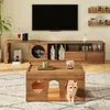 A living room scene featuring a TV stand with integrated cat amenities, a coffee table with cat entrances, and a television mounted on the wall. Voir les images du produit