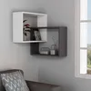 A modern living room corner with a white and gray wall-mounted shelf unit. Produktbild-Vorschau
