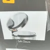 A close-up image of a stainless steel trash can with its lid open, showing the inside with a white liner. The text 'Soft Closure' is visible at the bottom. Produktbild-Vorschau