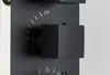 Close-up of a black shower control panel with temperature markings and an on/off indicator. Anteprima dell’immagine prodotto