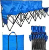 A blue portable team bench with a black metal frame, shown in three different configurations: fully assembled, folded into a carrying bag, and folded for storage. The bench has side pockets. Náhled obrázku produktu