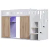 A loft bed with integrated storage and stairs. Voir les images du produit