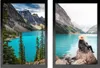 Two framed landscape photos of a lake and mountains. Produktbild-Vorschau