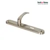 A silver-colored door handle with a long plate and a curved handle, shown from a diagonal angle on a white background. A logo and text are visible in the top right corner. Produktbild-Vorschau