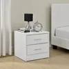 A white nightstand with two drawers is shown next to a bed. Podgląd zdjęcia produktu