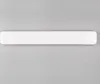 A white LED ceiling light is shown horizontally against a light gray background. Produktbild-Vorschau