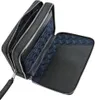 A black leather clutch bag with multiple compartments, shown open. Produktbild-Vorschau