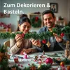 A couple is decorating a Christmas garland. Anteprima dell’immagine prodotto