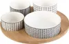 Quatre bols en porcelaine sur un plateau en bambou pour Voir les images du produit 11
