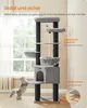 A cat tree with multiple levels and scratching posts, positioned near a window with curtains. A cat is shown jumping towards the tree. Produktbild-Vorschau