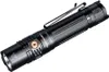 A studio shot of a black and gray flashlight with a copper button, set against a white background. Produktbild-Vorschau