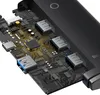 Close-up view of a disassembled electronic device, showing the internal circuit board and ports. Voir les images du produit