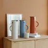 Stelton EM77 Verseuse isolante 1 l. red Voir les images du produit 4