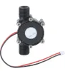 A black micro water generator with red and black wires and a white connector. Náhled obrázku produktu