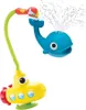 A yellow submarine bath toy with a blue whale sprinkler attachment. Anteprima dell’immagine prodotto