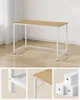 A modern desk with a wood top and white metal frame, shown from different angles in close-up shots. Produktbild-Vorschau