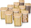 A collection of glass storage jars with bamboo lids, filled with various types of pasta and nuts. Podgląd zdjęcia produktu