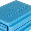 A close-up shot of a folded blue foam seat cushion with the brand name embossed on it. Produktbild-Vorschau
