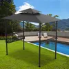 A grill gazebo with side shelves is set up on a grassy lawn next to a swimming pool and a wooden deck. Voir les images du produit