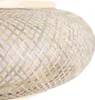 A close-up view of a woven bamboo lampshade. Náhled obrázku produktu