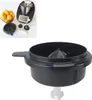 A kitchen appliance accessory, specifically a citrus juicer attachment, is shown alongside a bowl of oranges and other components of a food processor. Produktbild-Vorschau