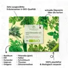 A flat lay image of a Kräutersamen Set packaging surrounded by various fresh herbs. Náhled obrázku produktu