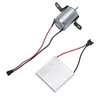 A small electric motor and a thermoelectric cooler module are shown on a white background. Voir les images du produit