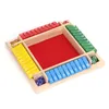 A wooden board game with colored numbered tiles and dice. Náhled obrázku produktu