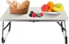 A foldable table with food items on it. Anteprima dell’immagine prodotto