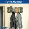 A coat rack mounted on a wall with two jackets hanging on it. Produktbild-Vorschau