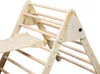 A close-up view of a wooden Montessori climbing triangle with a ramp attached. Náhľad obrázku produktu