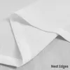 A close-up view of the neat edges of white linen curtains. Produktbild-Vorschau