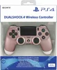 A Sony Playstation 4 Dualshock 4 Wireless Controller in Rose Gold, presented in its retail packaging. Produktbild-Vorschau