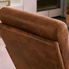 Close-up view of the textured brown upholstery of a chair. Náhľad obrázku produktu