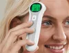 A person is using a digital thermometer on their forehead. Produktbild-Vorschau