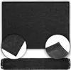 A black doormat is shown flat and also rolled up, with close-up insets of its texture and underside. Podgląd zdjęcia produktu