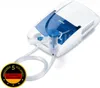 A white and blue Beurer inhaler with a nebulizer and tubing is shown on a white background. A circular emblem with German flag colors and text is in the lower left corner. Produktbild-Vorschau