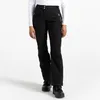 A person wearing black ski pants and boots, standing against a white background. Produktbild-Vorschau
