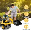A father and son are playing with a toy excavator in a park. Náhled obrázku produktu