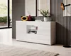 A modern white sideboard is displayed in a living room setting, with decorative items on top and a floor lamp nearby. Podgląd zdjęcia produktu