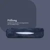 A dark gray background with a dark blue bolster pillow in the foreground. Text is overlaid on the left side. Podgląd zdjęcia produktu