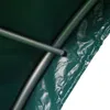 A close-up view of the internal structure of a green tent or shelter, showing the metal poles and the green fabric. Produktbild-Vorschau