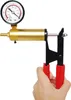 A hand holding a vacuum pump with a pressure gauge. Náhľad obrázku produktu