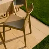 Outdoor patio setting with chairs and a table. Anteprima dell’immagine prodotto