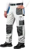 A person wearing work pants and shoes. Produktbild-Vorschau