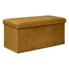 A studio shot of a gold velvet storage ottoman. Podgląd zdjęcia produktu