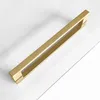 A single gold-colored shower enclosure handle is shown on a white background. Podgląd zdjęcia produktu